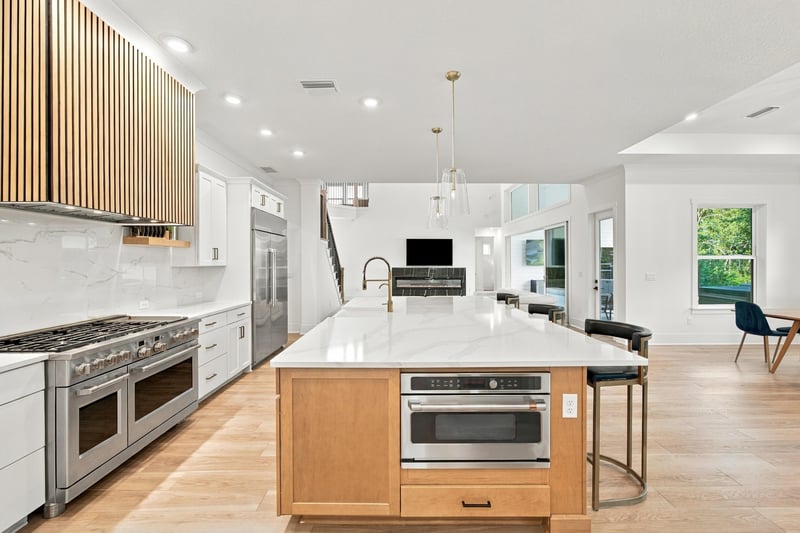 Kitchen with range and wood-tone island at 907 Seagrove Dr, Ponte Vedra Beach, FL 32081