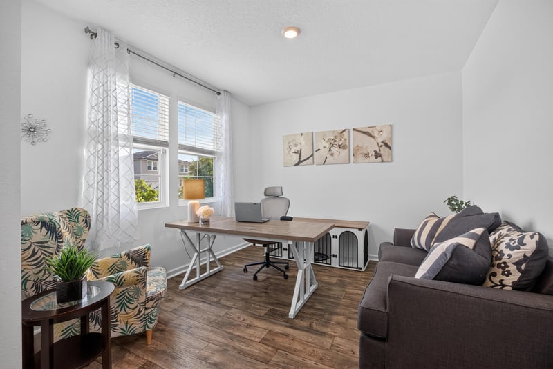Flex room with desk and sofa near front entry at 65255 Frst Glen Ln, Yulee, FL 32097