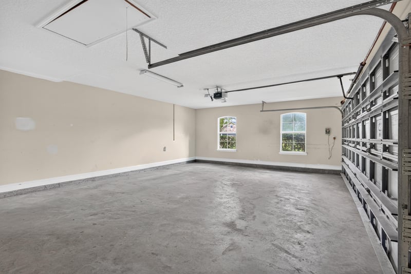 Three-car garage interior at 4109 Eagle Landing Pkwy, Orange Park, FL 32065