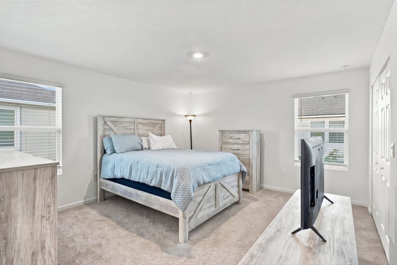Primary bedroom with natural light, photographed by Megapixeler on Haymon Ave, Jacksonville