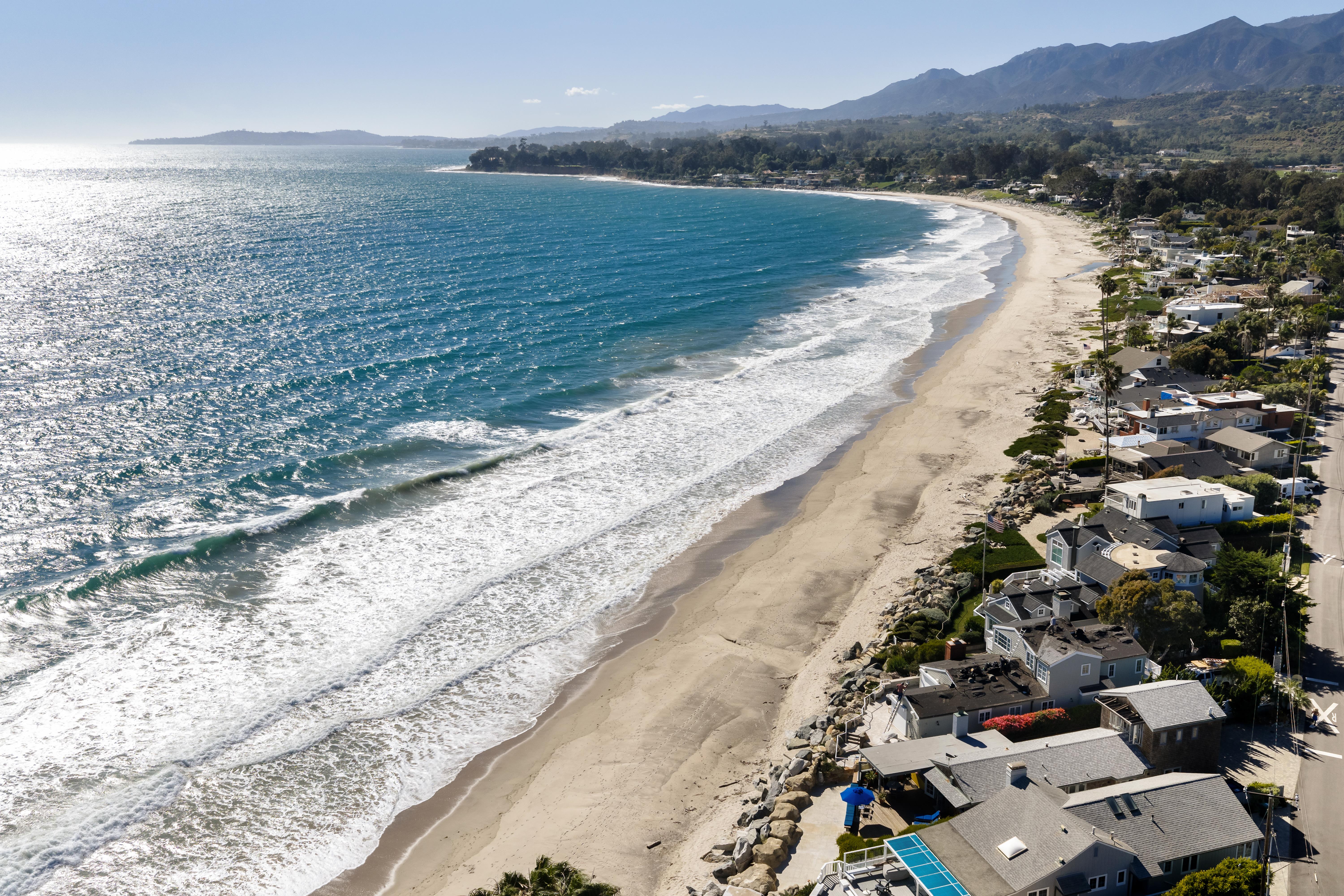 Aerial drone photography of 3581 Padaro Ln, Carpinteria CA — sweeping Southern California coastline and Santa Ynez Mountains backdrop by VirTour Media
