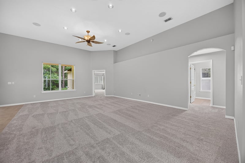 Living room with ceiling fan and carpet at 635 Wakeview Dr, Orange Park, FL 32065