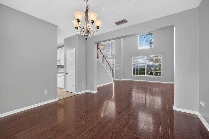 Hallway near staircase with wood floors at 470 Sparrow Branch Cir, Jacksonville, FL 32259