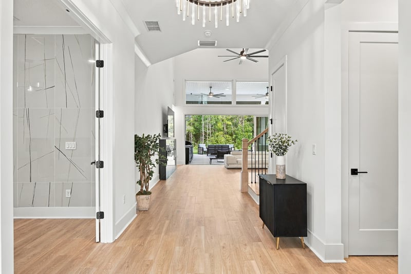 Entry hallway with wood floors leading to the great room at 907 Seagrove Dr, Ponte Vedra Beach, FL 32081