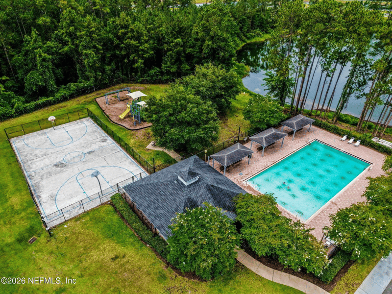 Aerial view of community basketball court and pool in Adams Lake, Jacksonville, FL