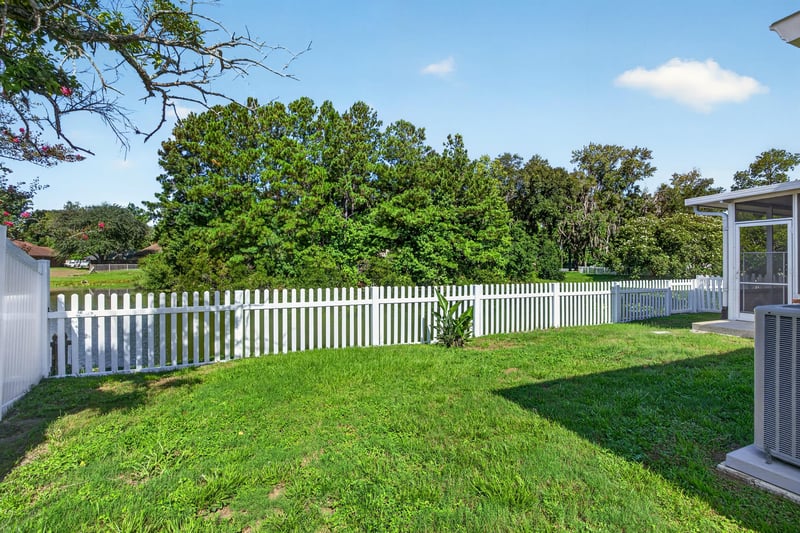 Backyard with fenced lawn at 11828 Heather Grove Ln, Jacksonville, FL