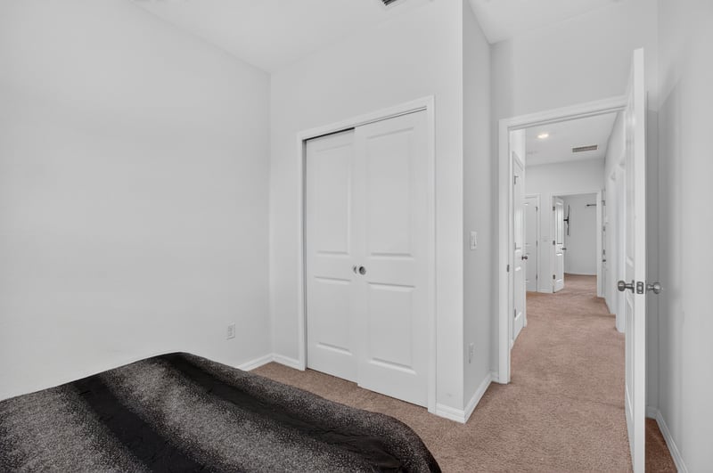 Hallway leading to bedroom doors at 339 Anthony Dr, Jacksonville, FL
