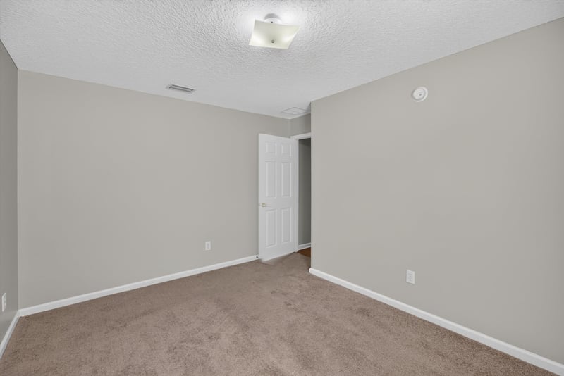 Carpeted bedroom at 14147 Fish Eagle Dr E, Jacksonville, FL 32226