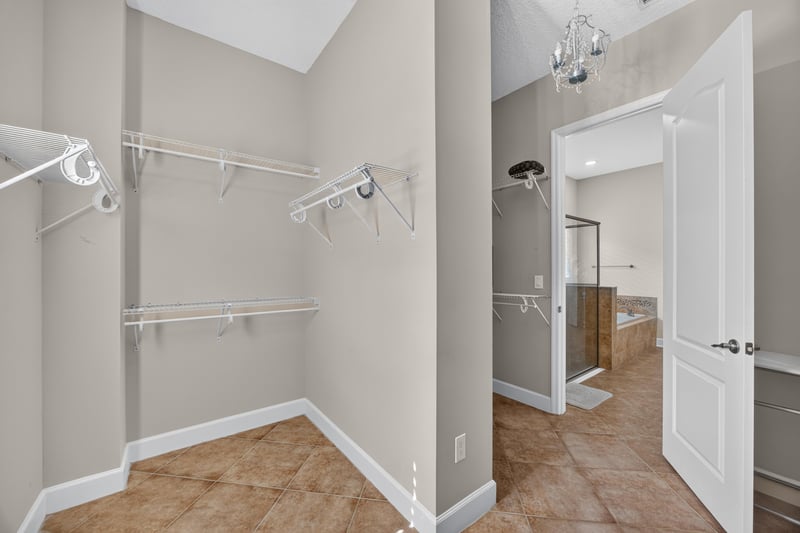Closet with hanging rods and shelving at 276 Cross Ridge Dr, Ponte Vedra Beach, FL 32081