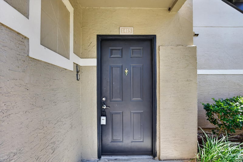 Front door entry at 1701 The Greens Way 1415, Jacksonville Beach, FL 32250