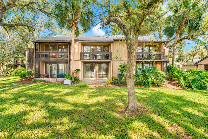 Rear exterior view of building and balcony at 7703 Las Palmas Way