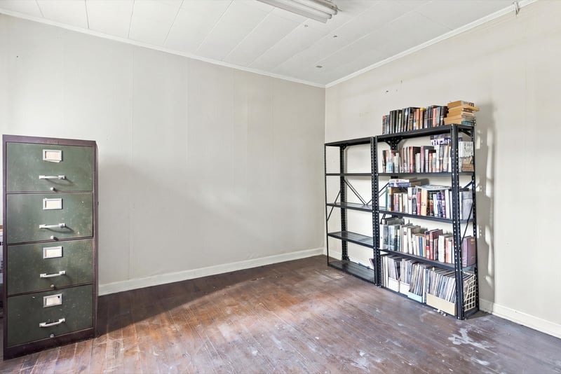 Empty room with shelving unit and filing cabinet at 1807 Idlewild Ave, Green Cove Springs, FL