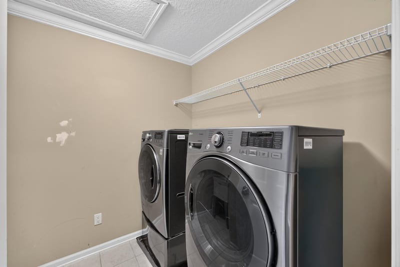 Laundry room with washer and dryer at 1493 Greyfield Dr, St. Augustine, FL 32092