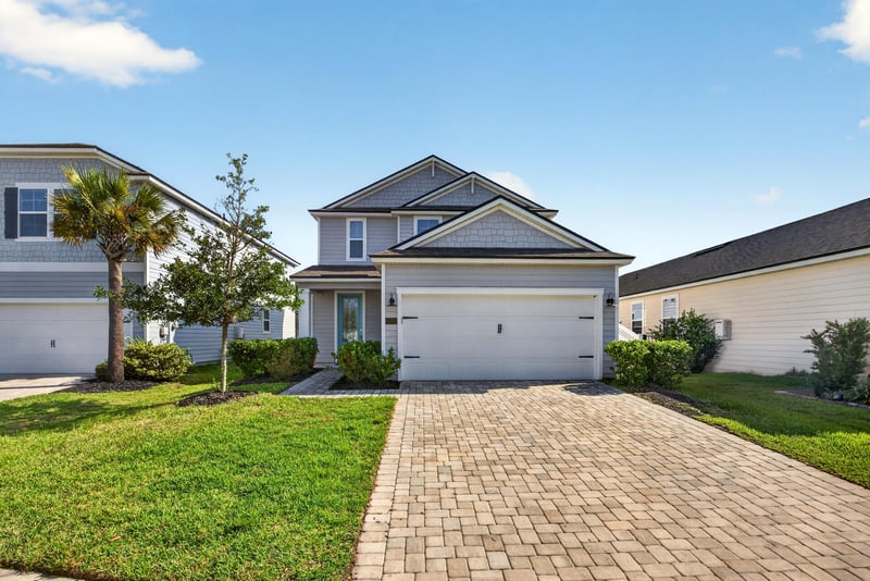 Front exterior with paver driveway at 331 Millerstone Dr, St. Augustine, FL 32092