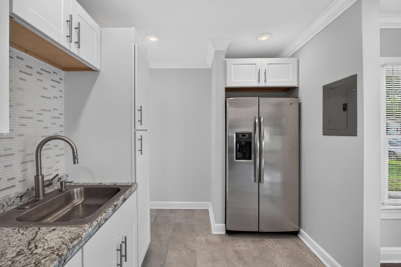 Kitchen sink and stainless refrigerator at 316 W 41st St, Jacksonville, FL 32206