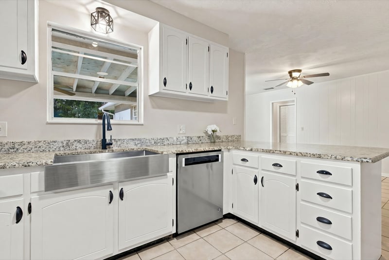 Kitchen interior view with sink and cabinets, photographed by Megapixeler on Crosby Ln, Orange Park