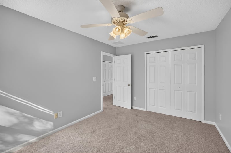 Hallway with closet doors at 470 Sparrow Branch Cir, Jacksonville, FL 32259