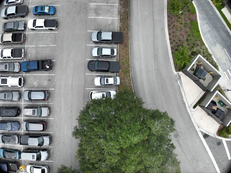 Aerial view of parking lot and landscaped walkway at 9406 Atlantic Blvd, Jacksonville, FL 32225