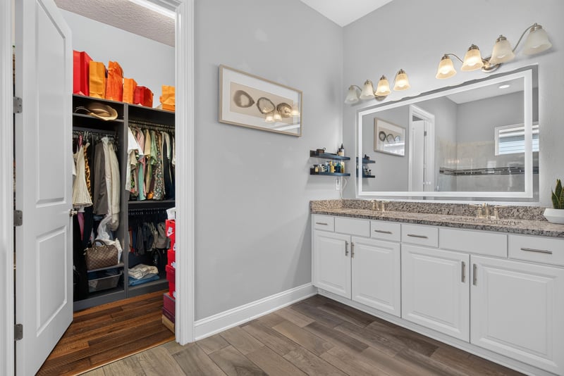 Walk-in closet with vanity mirror at 3328 Southern Oaks Dr, Green Cove Springs, FL 32043