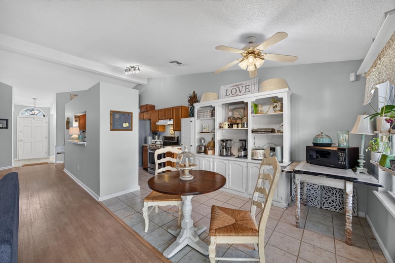 Breakfast nook with round table and built-ins at 4556 Shaky Leaf Ln N, Jacksonville, FL 32224