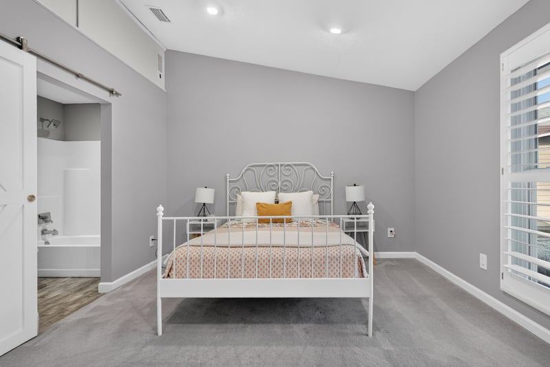 Bedroom with barn door entry, photographed by Megapixeler on Birch Run E, Orange Park