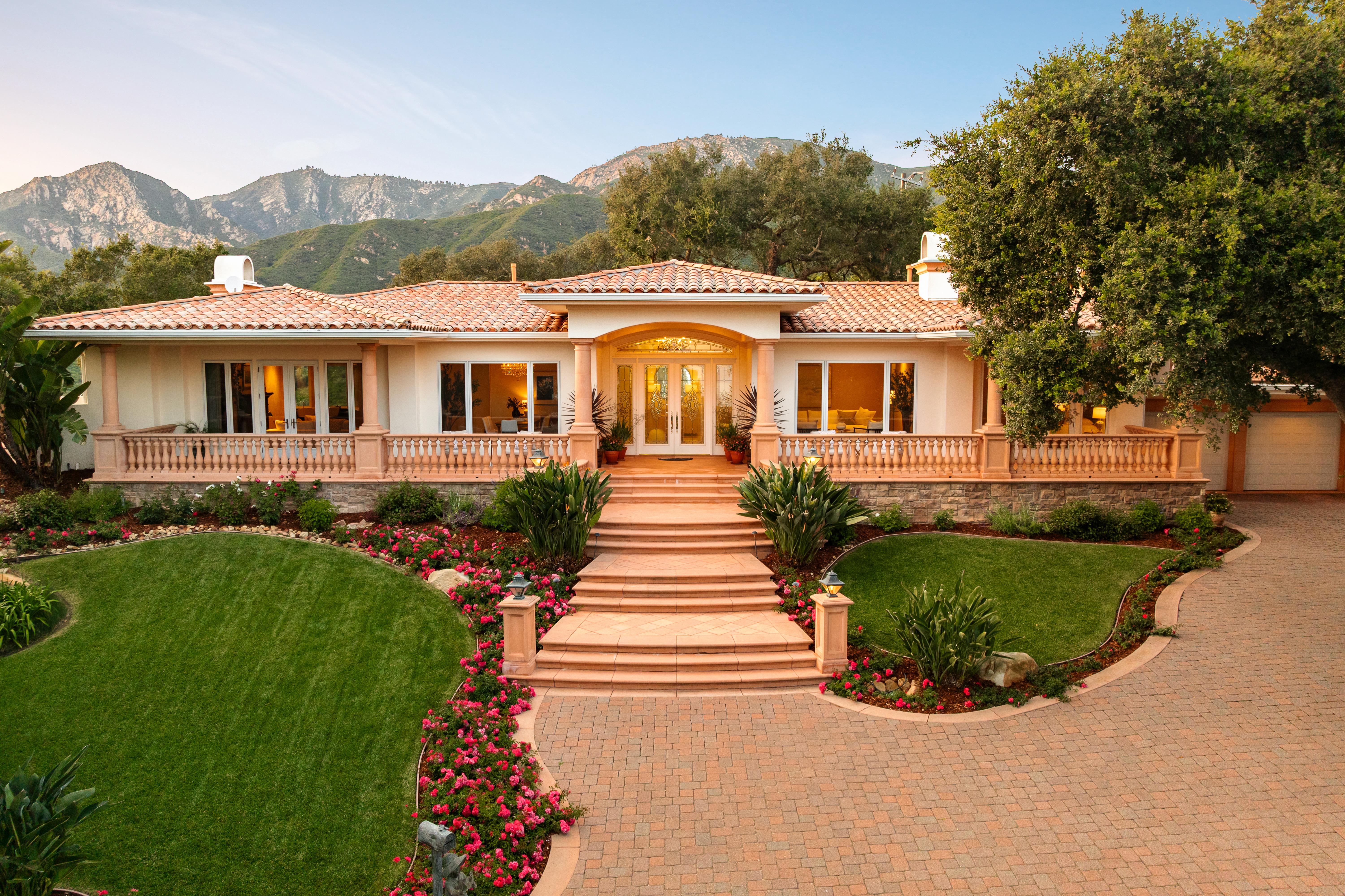 Interior living room photography at luxury Montecito-area estate, 450 El Cielito Rd, Santa Barbara — virtual real estate photography highlighting volume, natural light, and refined finishes with Channel Islands visible beyond. Our team captured still photography, aerial drone photography, twilight photography, a Matterport virtual tour, a 2D floor plan, and a custom property website from afternoon through twilight.