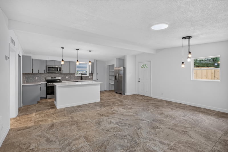 Kitchen with pendant lighting and tile floor at 3113 Kline Rd, Jacksonville, FL 32246