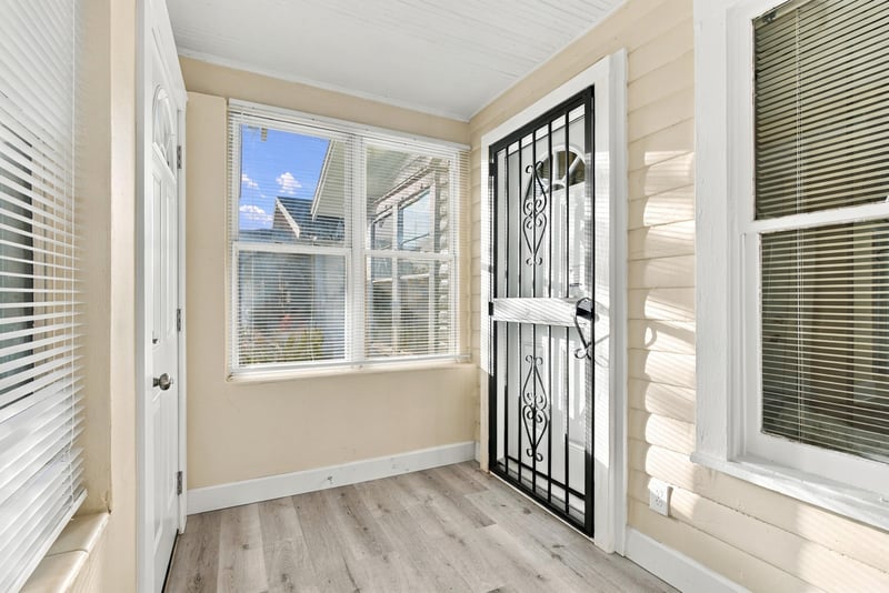Front door with security gate, photographed by Megapixeler on W 24th St, Jacksonville