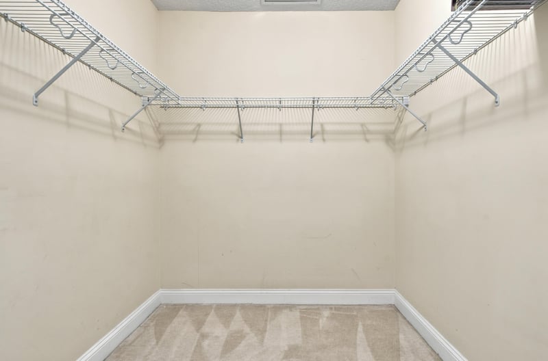 Walk-in closet with built-in shelving, photographed by Megapixeler on Riverplace Blvd, Jacksonville