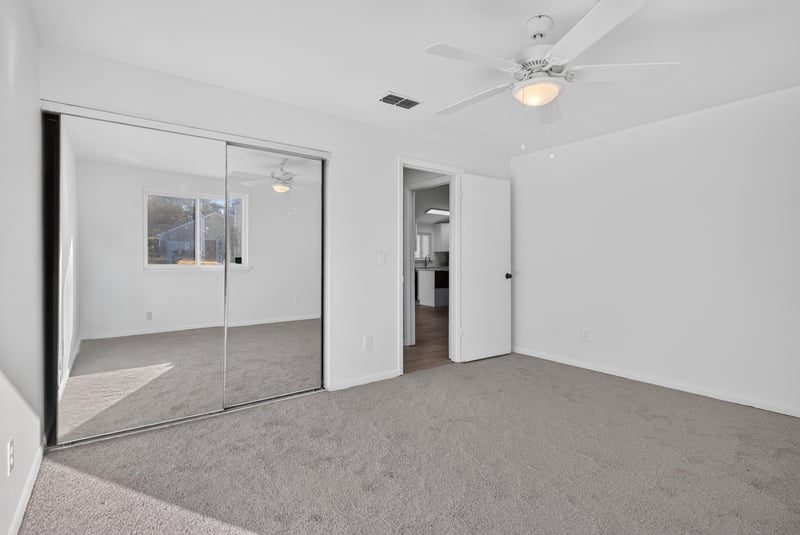 Closet with mirrored sliding doors at 8177 Virgo St, Jacksonville, FL 32216