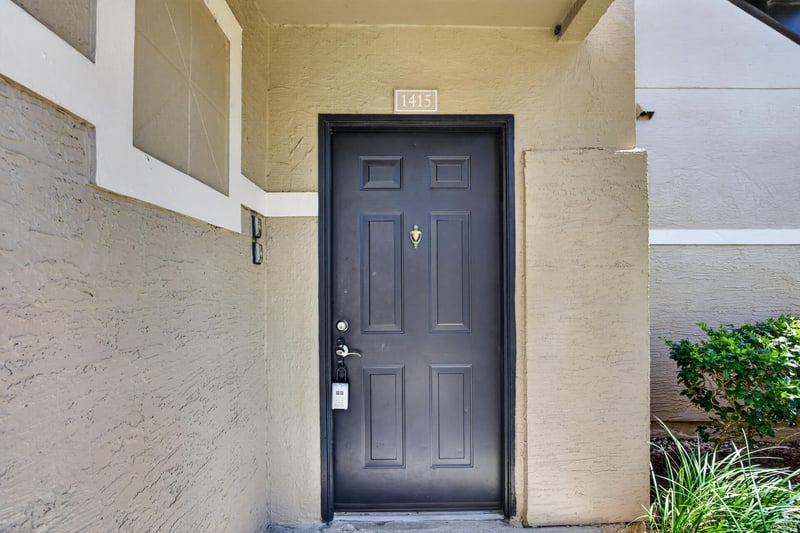 Front door entry at 1701 The Greens Way 1415, Jacksonville Beach, FL 32250