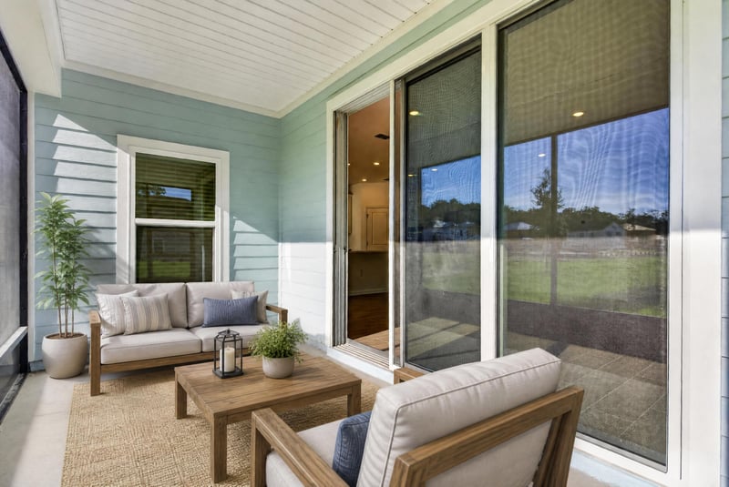 Screened lanai overlooking open lawn at 269 Bluegrass Wy, St. Augustine, FL 32092