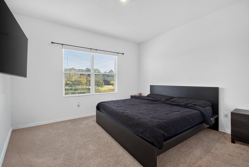 Bedroom with carpet and window at 339 Anthony Dr, Jacksonville, FL