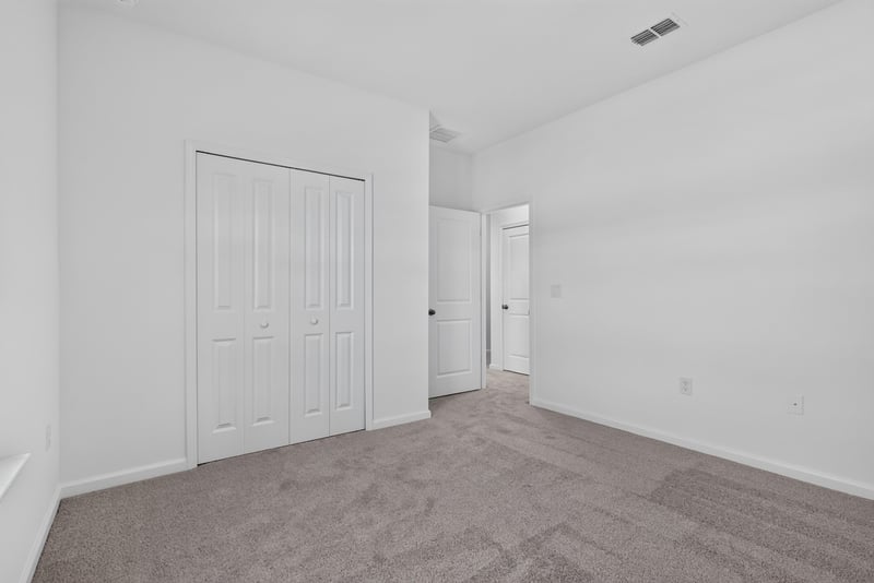 Hallway with closet doors at 269 Bluegrass Wy, St. Augustine, FL 32092