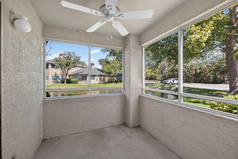 Screened lanai with windows overlooking the grounds at 1701 The Greens Way 1415, Jacksonville Beach, FL 32250