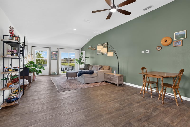 Dining area with table and vaulted ceiling at 4276 Quaking St, Jacksonville, FL 32218