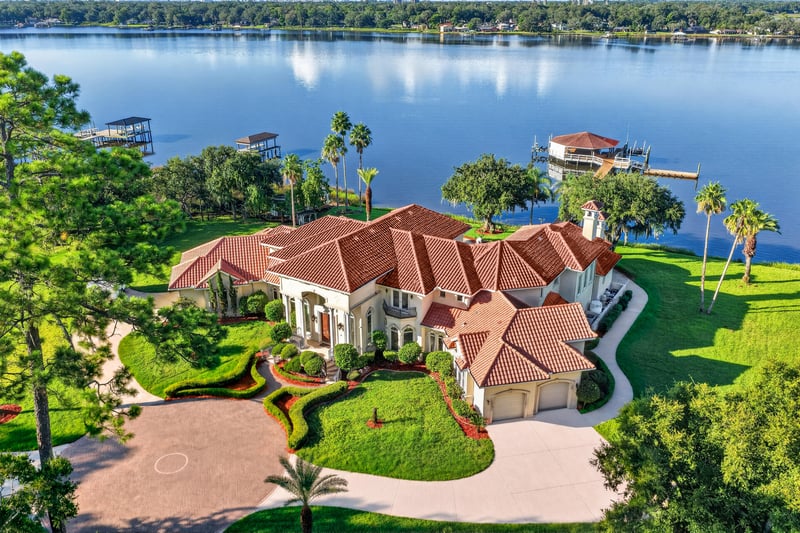Aerial view closer over the home and waterfront at 344 Broward Rd, Jacksonville, FL