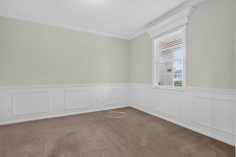 Formal room with wainscoting and carpet at 263 Gilmore Ln, Orange Park, FL 32065