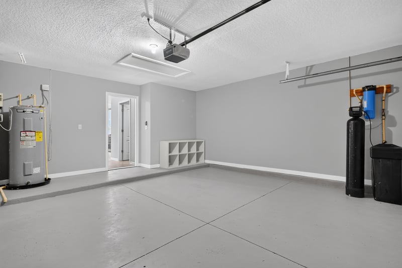 Garage with storage shelving at 706 Grampian Highlands Dr, St. Johns, FL 32259
