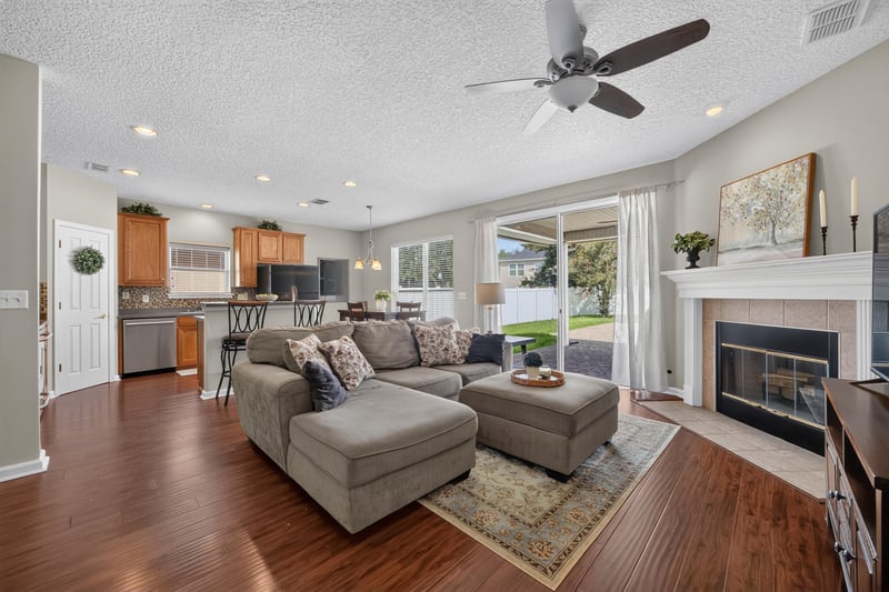 Living room open to the kitchen at 3660 Middlebrook Dr, Orange Park, FL 32065