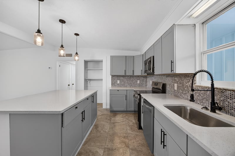 Kitchen with white countertops and window over sink at 3113 Kline Rd, Jacksonville, FL 32246