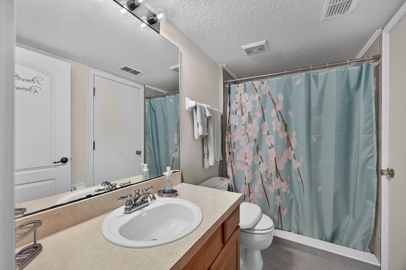 Bathroom with shower-tub combo and vanity at 3112 Silverado Cir, Green Cove Springs, FL 32043