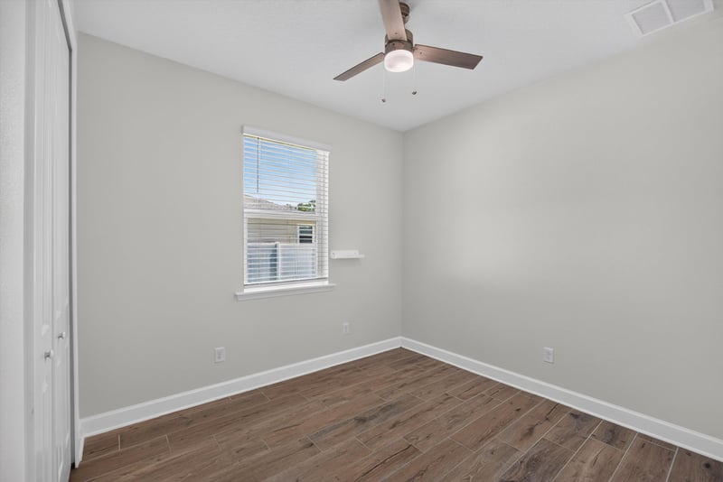 Bedroom with window at 855 Flach Dr, St. Johns, FL