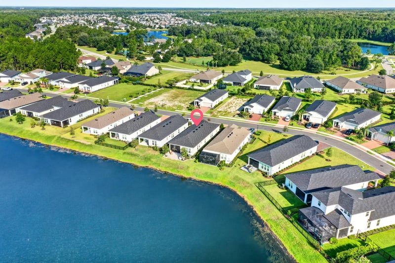Aerial view of the pond and surrounding homes in St. Augustine, FL