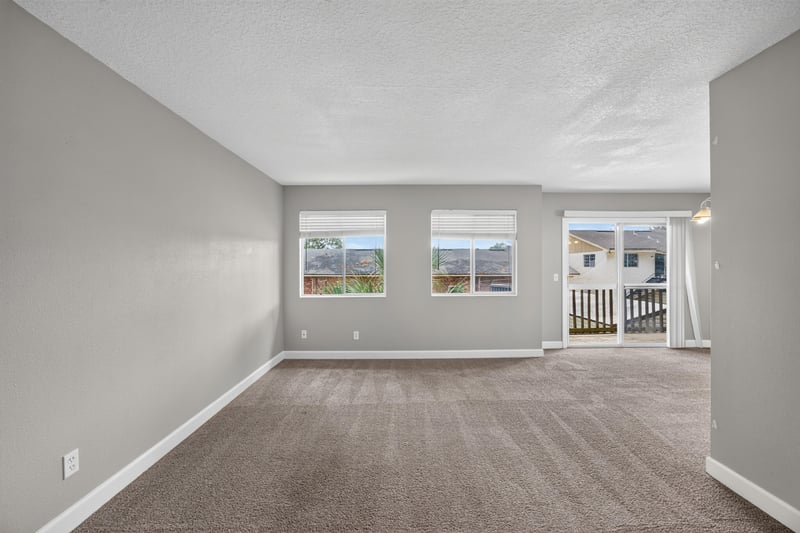 Living room with carpet and windows at 1800 Park Ave apt 358, Orange Park, FL