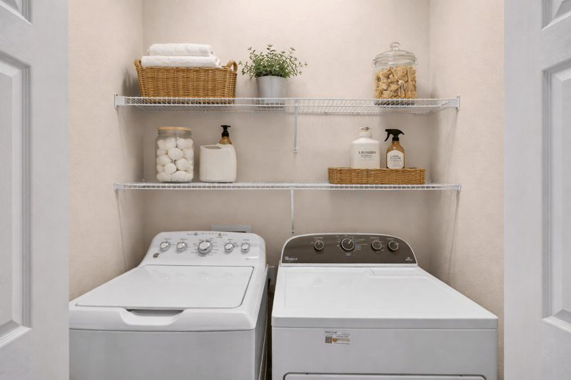 Laundry Room with decor at 11804 Surfbird Cir, Jacksonville, FL 32256