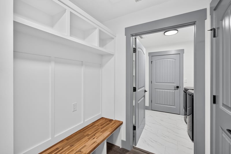 Hallway closet with shelving at 4800 Acacia St, Middleburg, FL 32068