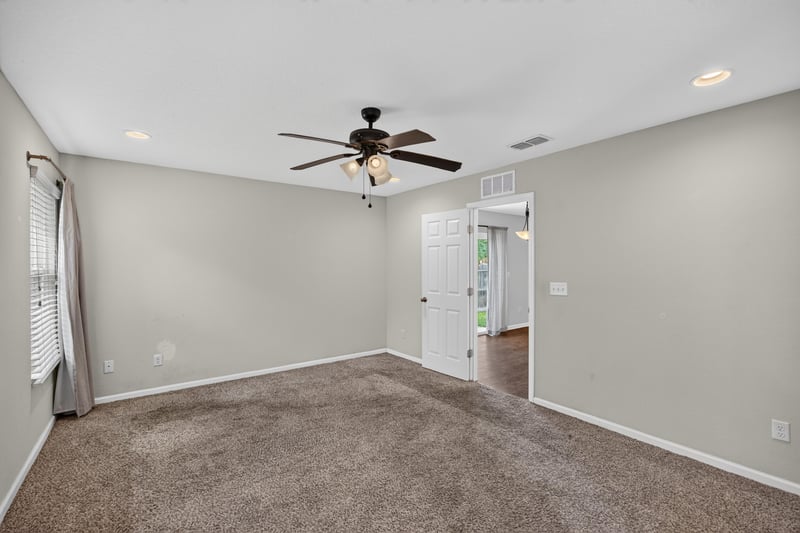 Empty carpeted room with ceiling fan at 1002 Ingleside Ave, Jacksonville, FL 32205