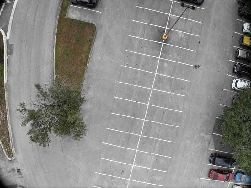Aerial view of parking lot and shrub island at 9406 Atlantic Blvd, Jacksonville, FL 32225