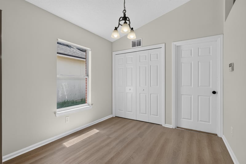 Empty room with two closet doors at 224 Pine Arbor Cir, St. Augustine, FL 32084